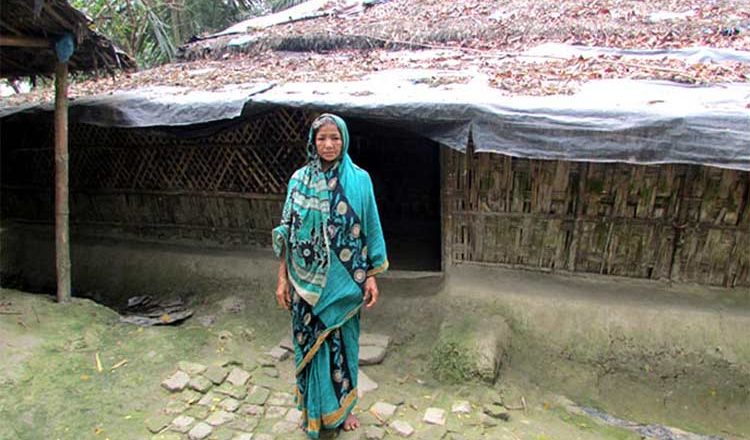 Poor family receiving food support during flood